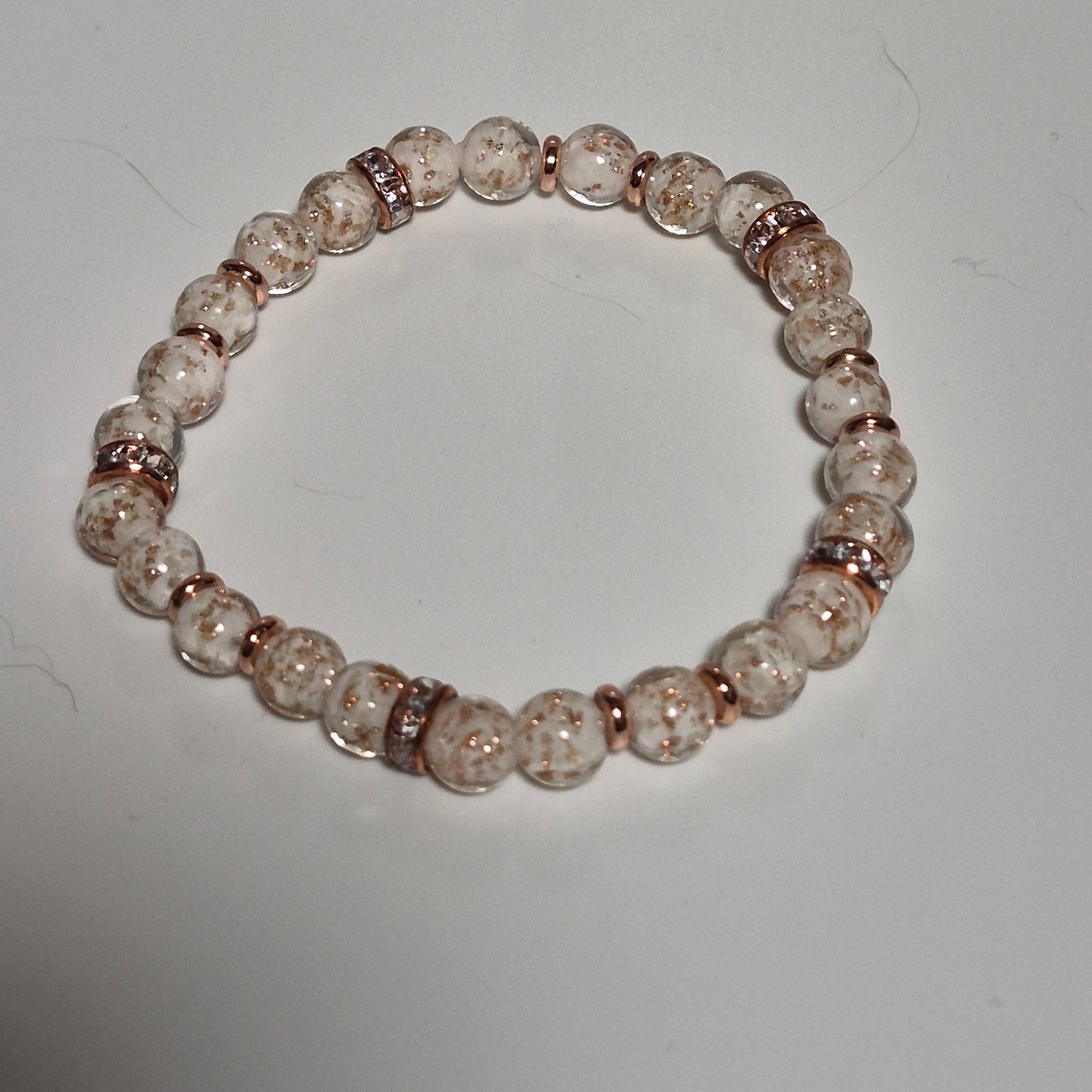 White Glow in the Dark Stretch Bracelet #1, Handmade Gold Fleck Glass Bead Bracelet with Rose Gold Rhinestone Rondelles
