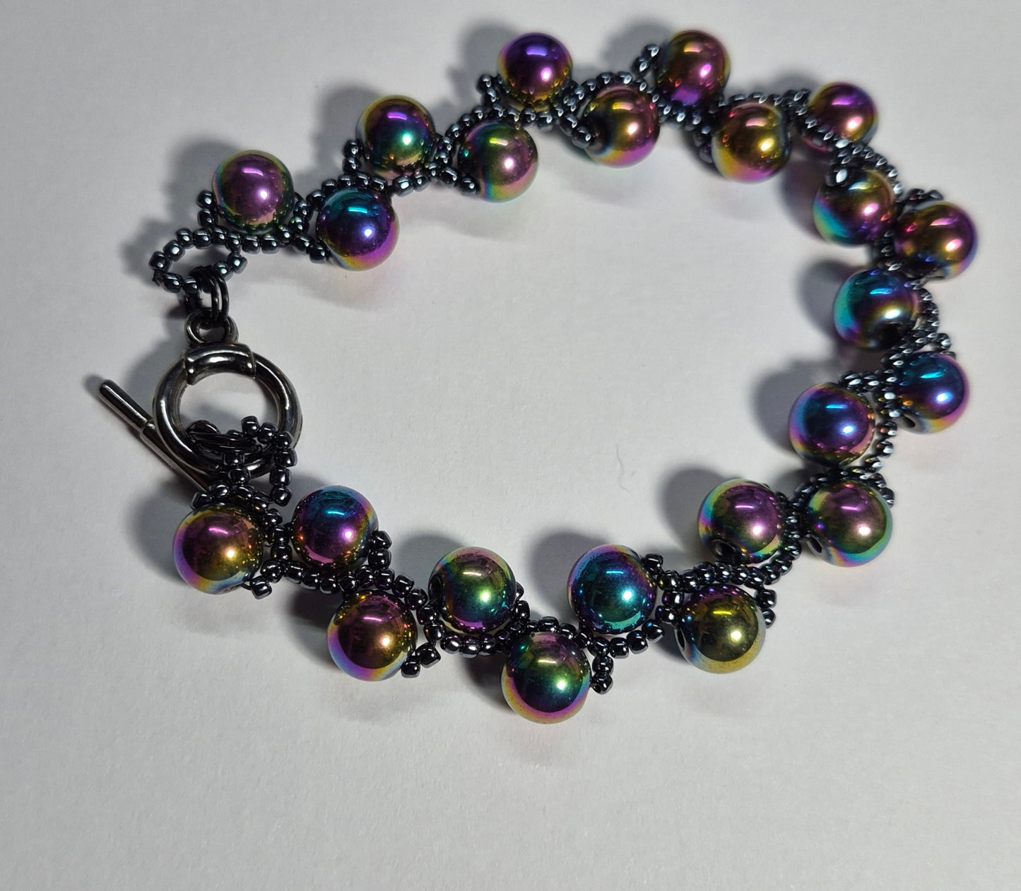 Rainbow Hematite Woven Bracelet – Handmade Iridescent Beaded Bracelet with Toggle Clasp