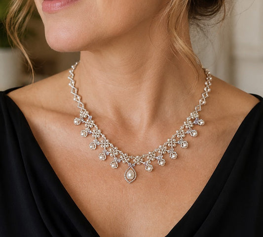 Pearl and crystal beadwoven lace fringe necklace worn with black dress