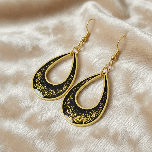 Golden Twilight Glitter Earrings - angled view on velvet