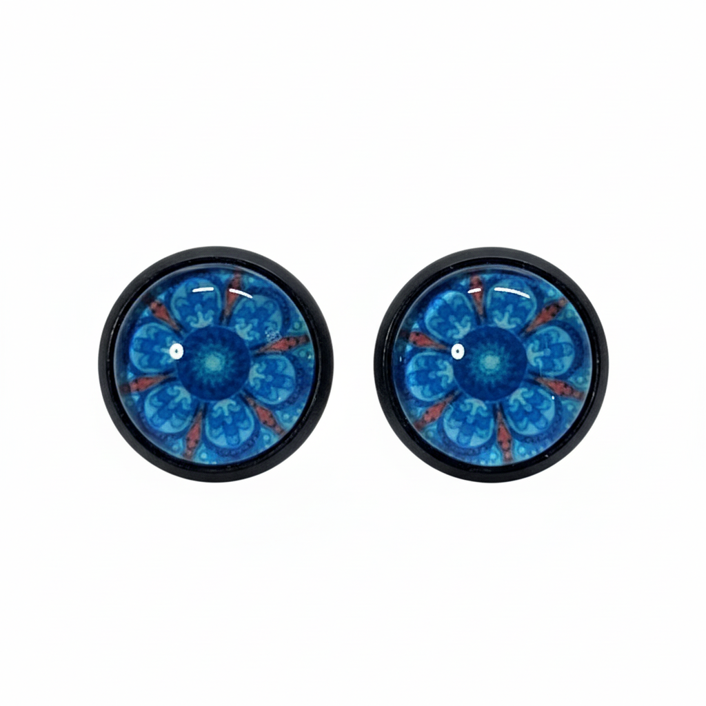 Octopus mandala stud earrings with blue tentacles and coral accents in black bezels