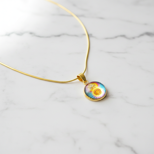 Sun and moon celestial petite pendant necklace on white marble surface