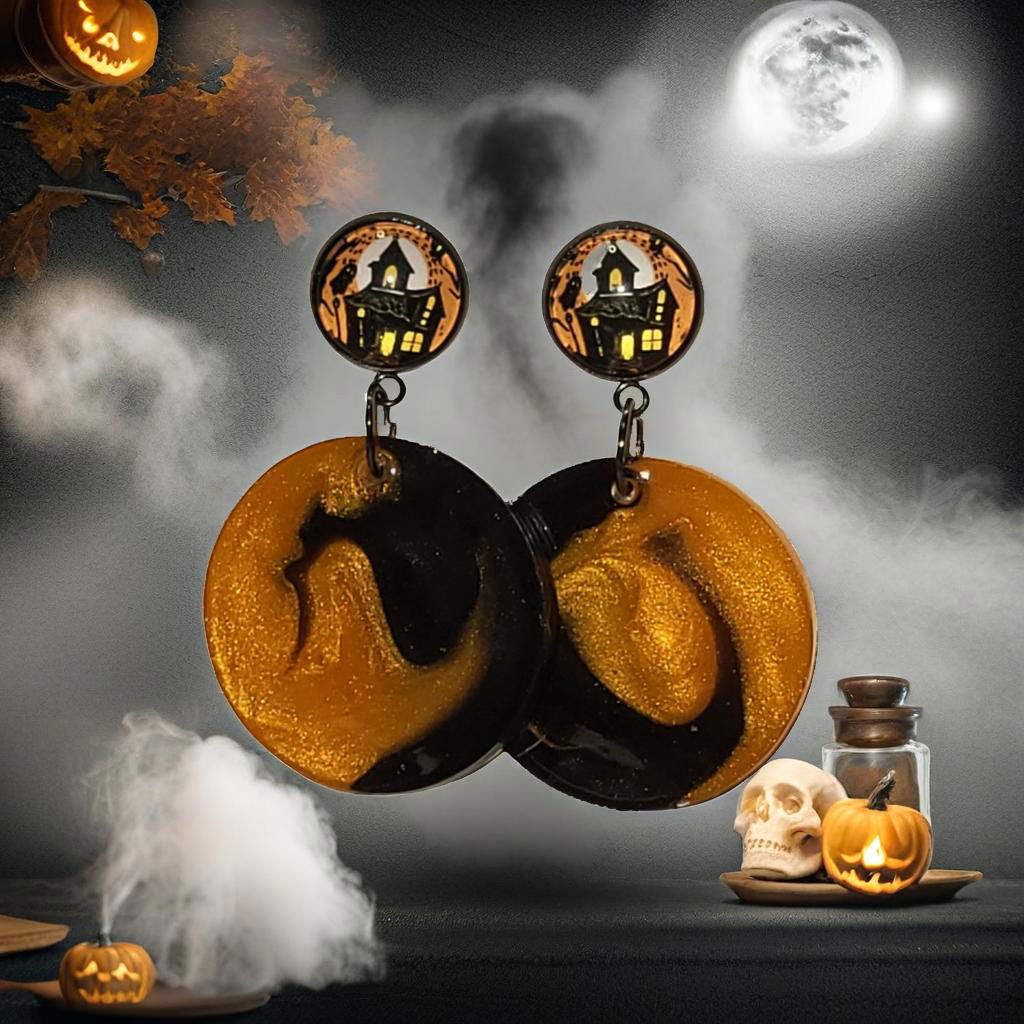 Black and gold swirl resin circle Halloween earrings styled in spooky moonlit scene with pumpkins and skull