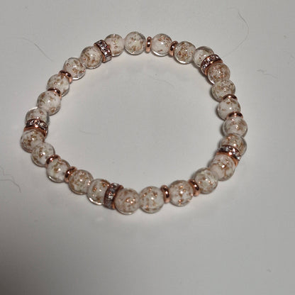 White Glow in the Dark Stretch Bracelet #1, Handmade Gold Fleck Glass Bead Bracelet with Rose Gold Rhinestone Rondelles