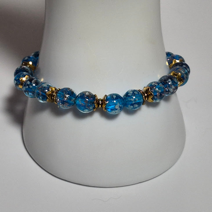 Light Blue Glow in the Dark Stretch Bracelet with Gold Sparkle