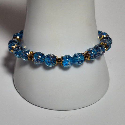 Light Blue Glow in the Dark Stretch Bracelet with Gold Sparkle