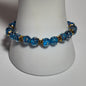 Light Blue Glow in the Dark Stretch Bracelet with Gold Sparkle