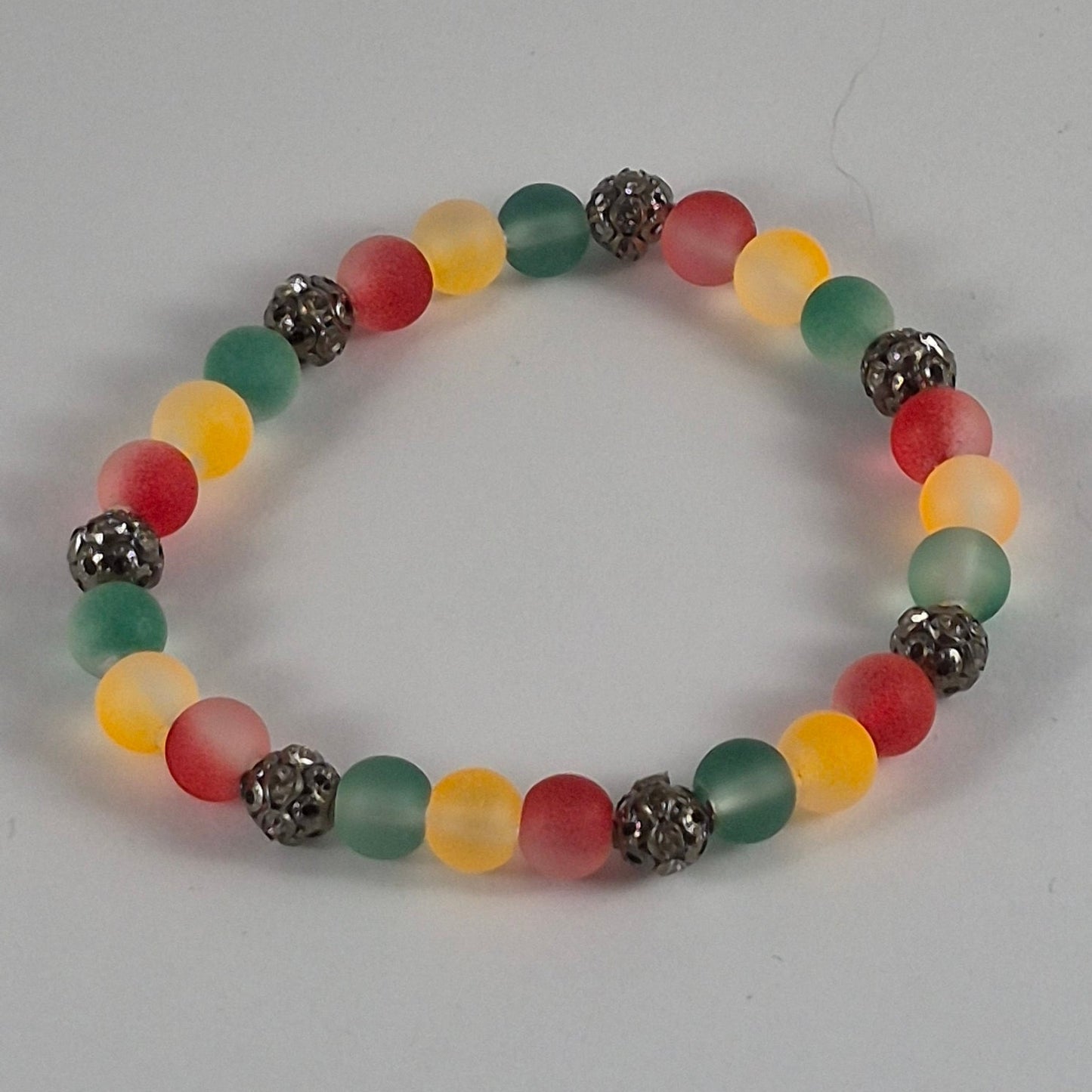 Reggae Glow in the Dark Glass Bead Stretch Bracelet – Handmade Red Yellow Green Gunmetal Jewelry Gift for Her