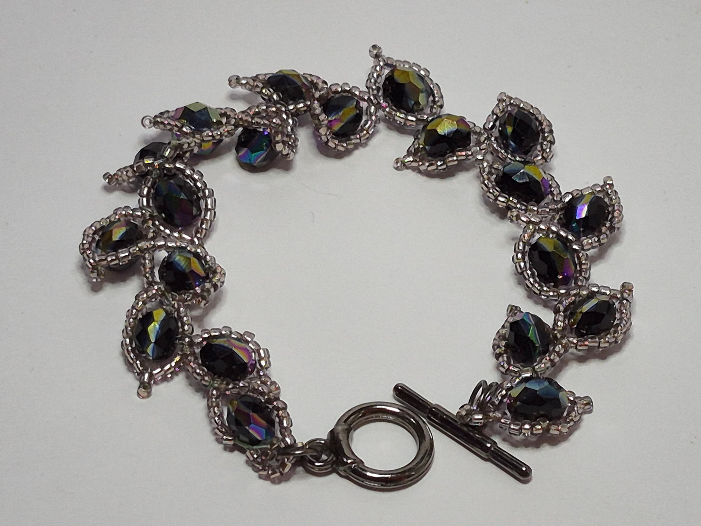 Leafy Vine Iridescent Crystal Bracelet – Handmade Beaded Bracelet with Faceted Rondelles & Toggle Clasp