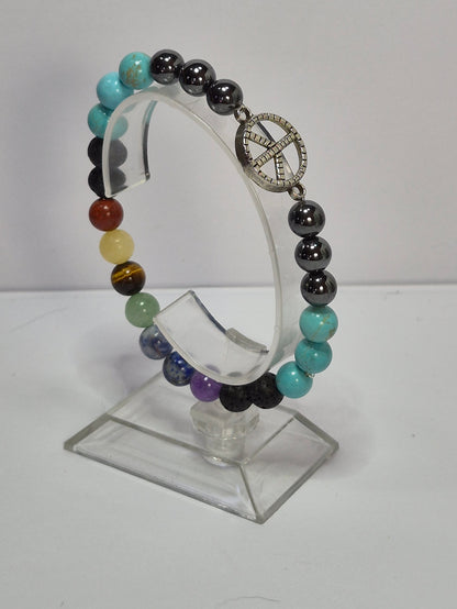 7 Chakra Stretch Bracelet – Hematite, Turquoise & Lava Stone with Silver Peace Sign Charm