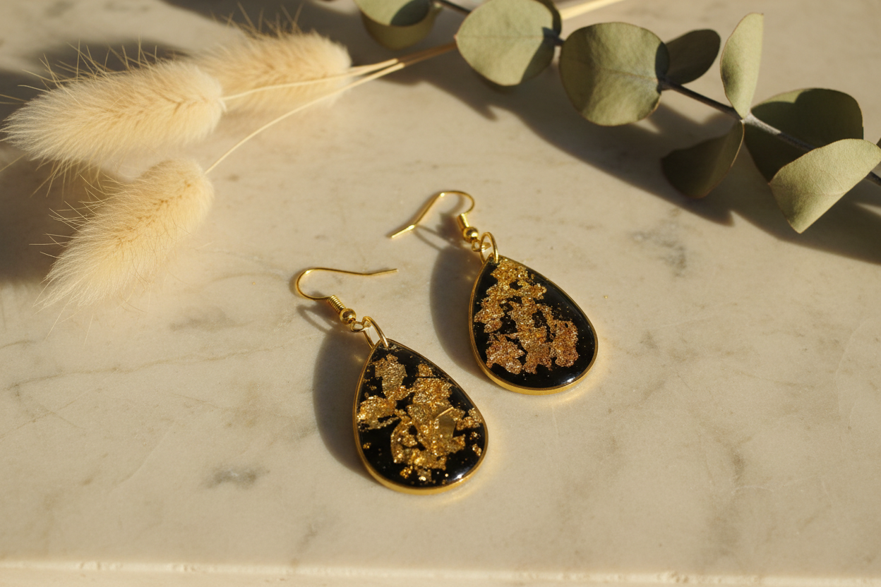 Black and gold earrings with natural stone and botanicals