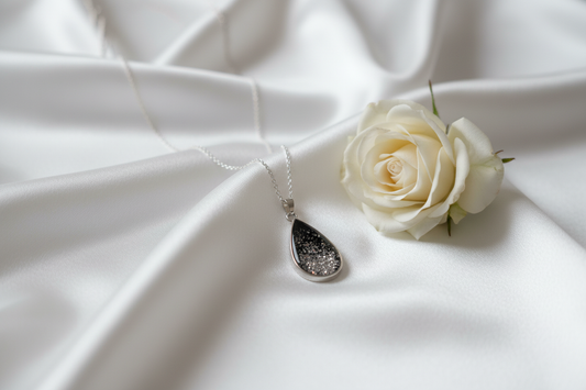 Elegant silver pendant on silk