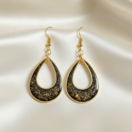 Golden Twilight Glitter Earrings - front view on silk