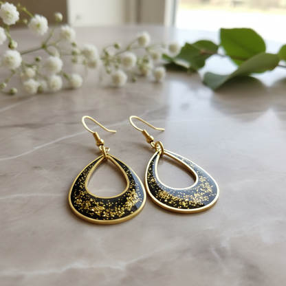 Golden Twilight Glitter Earrings - detail view with florals