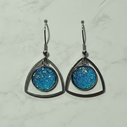 Ocean Sparkle Triangle Drop Earrings with blue glitter cabochons in gunmetal frames