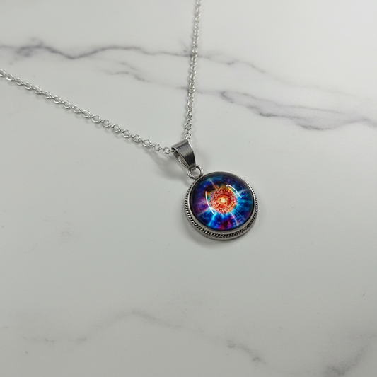 Cosmic nebula petite pendant necklace on white marble surface