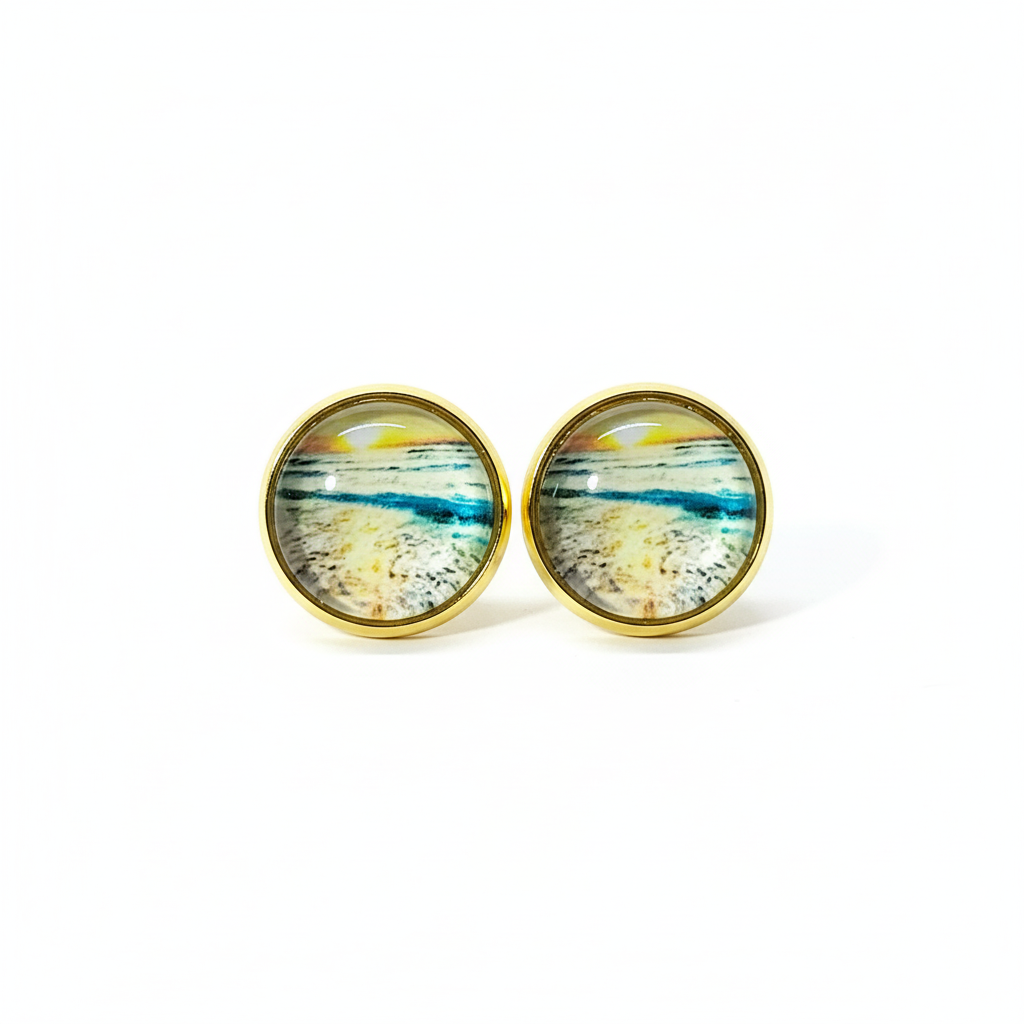 Beach scene stud earrings on white background