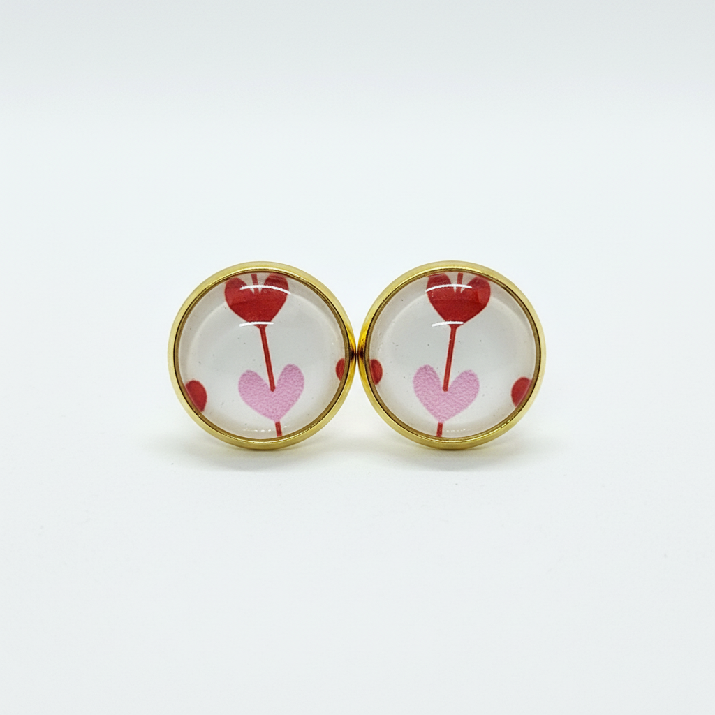 Heart balloon stud earrings on white background