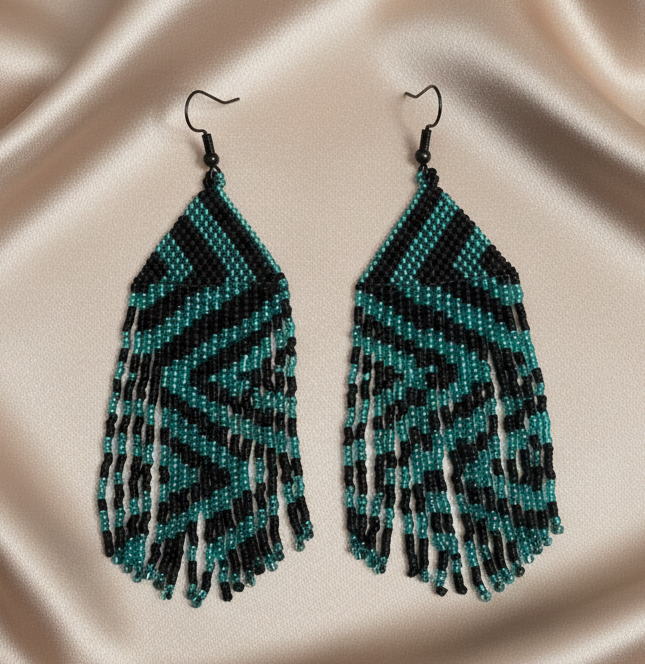 Teal and black geometric beaded fringe earrings, front view