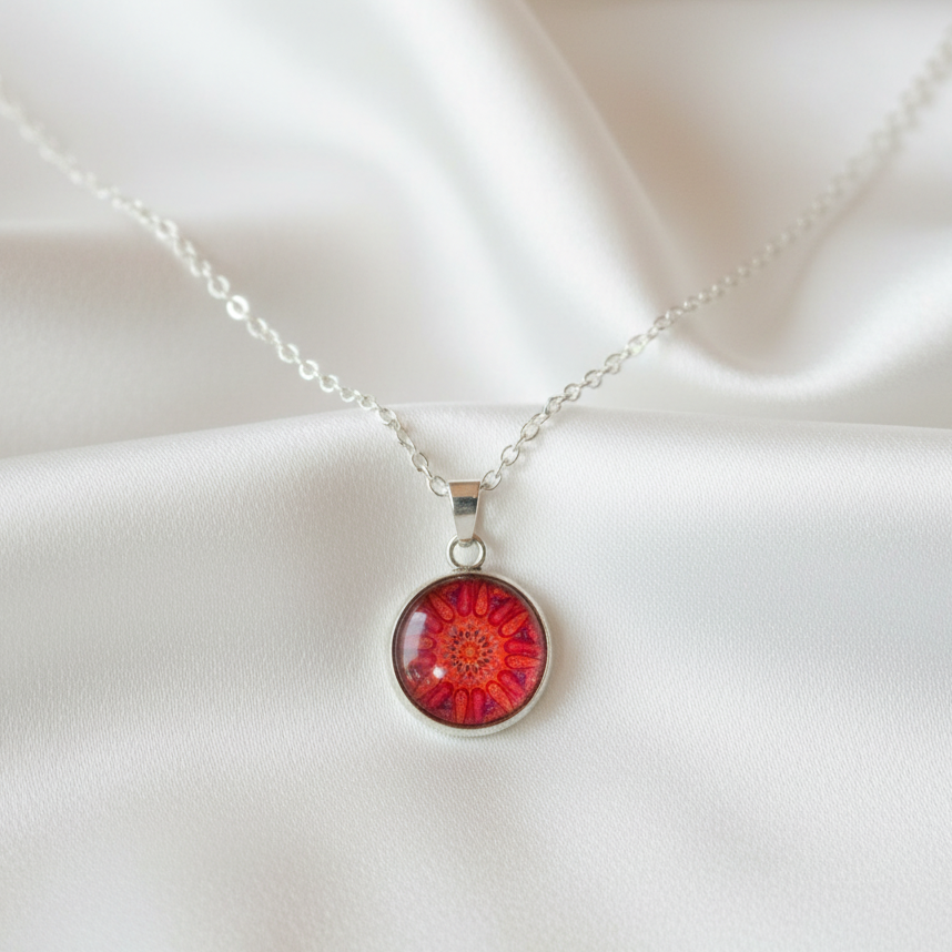 Red coral mandala petite pendant necklace hero shot on white satin