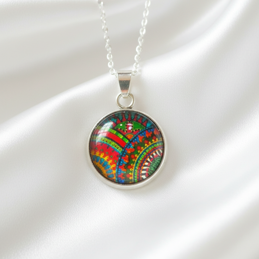 Rainbow paisley petite pendant necklace hero shot on white satin