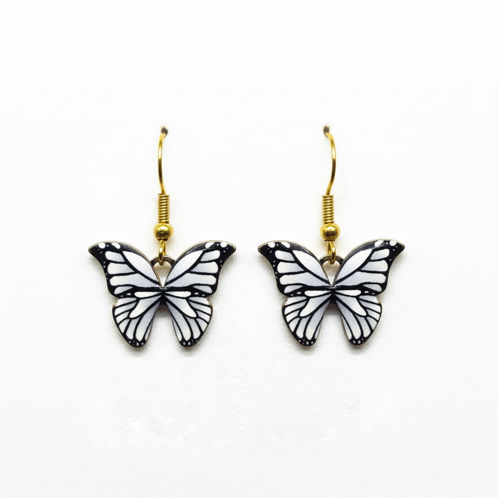 Classic Black and White Butterfly Earrings - elegant enamel butterfly dangle earrings with gold hooks