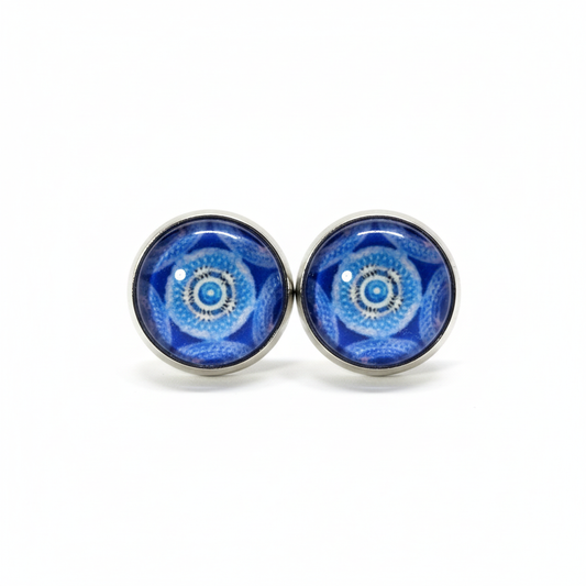 Blue mandala pattern stud earrings on white background