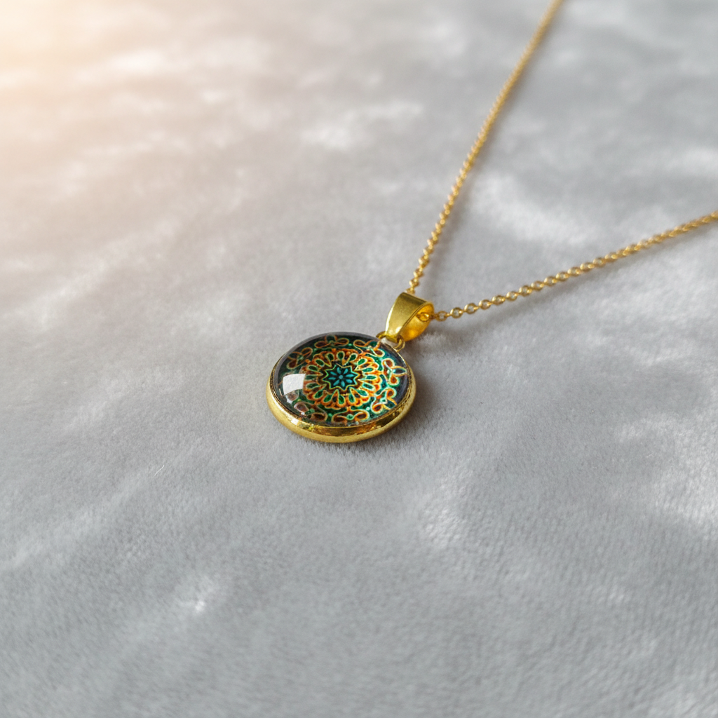 Angled view of petite psychedelic mandala pendant on velvet background