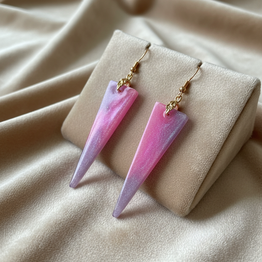Lavender Blush Triangle Earrings - angled view on velvet