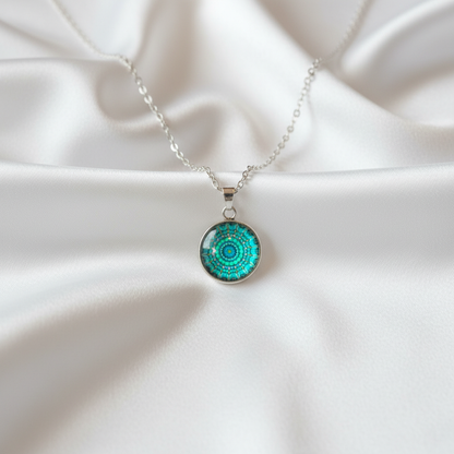 Turquoise mandala petite pendant necklace hero shot on white satin