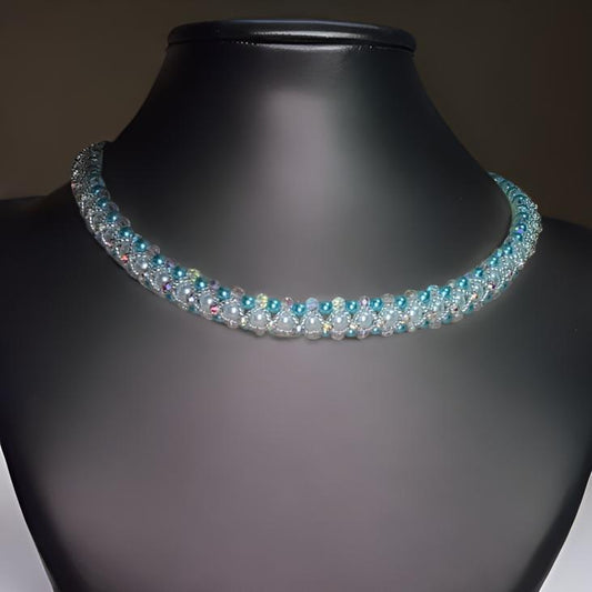 Teal and white beadwoven collar necklace on mannequin bust, no clasp visible